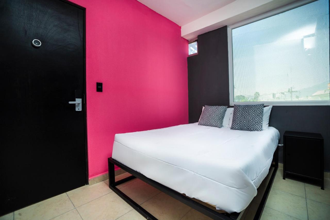 Hotel cápsula Adhoc Cintermex Monterrey